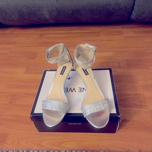 Silver multi sandals.